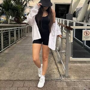 Black romper with adjustable straps, worn once.